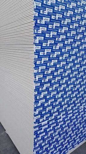 Close-up view of gypsum board edge and surface